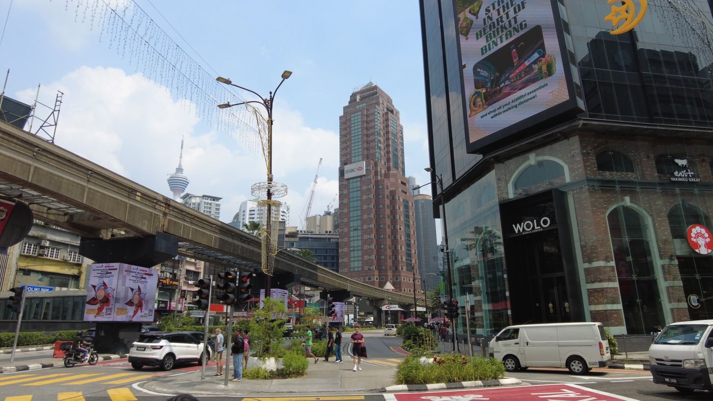 Bukit Bintang street in Kuala Lumpur with the monorail and KL Tower